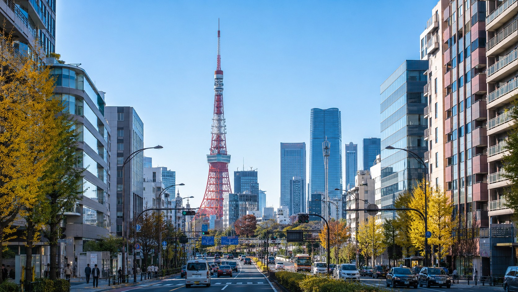 Vue_urbaine_de_Tokyo_avec_Tokyo_Tower_avenue_ensoleillee_gratte_ciels_circulation_et_arbres_jaunes_2026_format_16_9